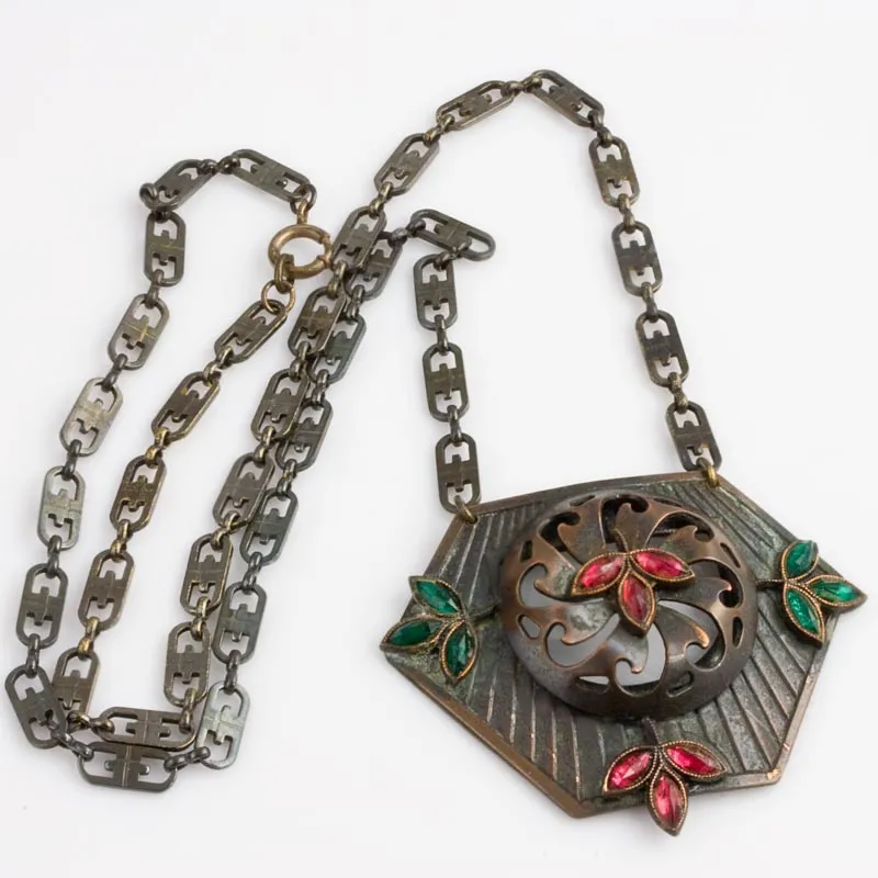 Arts and Crafts brass pendant necklace with navette rhinestones. j-nled483